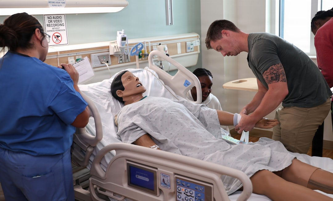 Charge nurse coordinating staff nurses at a hospital unit station