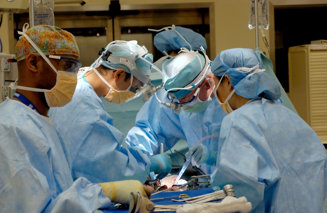 Perioperative surgical team working together in the operating room