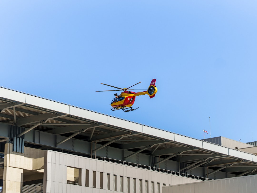 Air ambulance helicopter landing on a hospital helipad