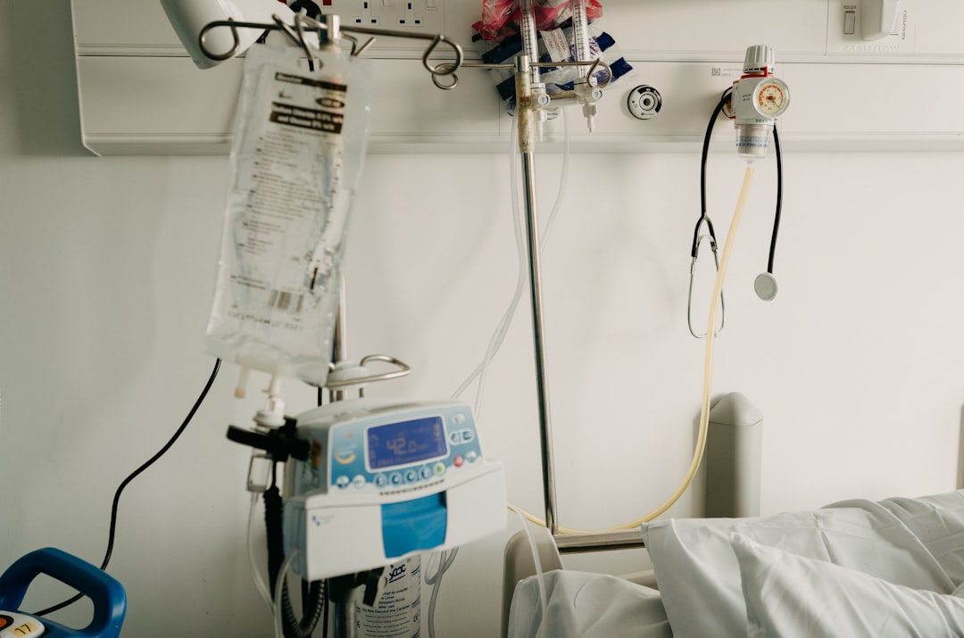 IV fluid bag hanging on a pole, central to fluid-volume management