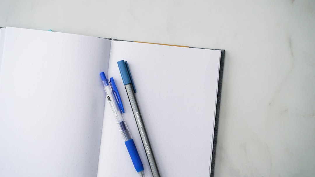 Grammar study notes and a highlighted rule sheet on a desk