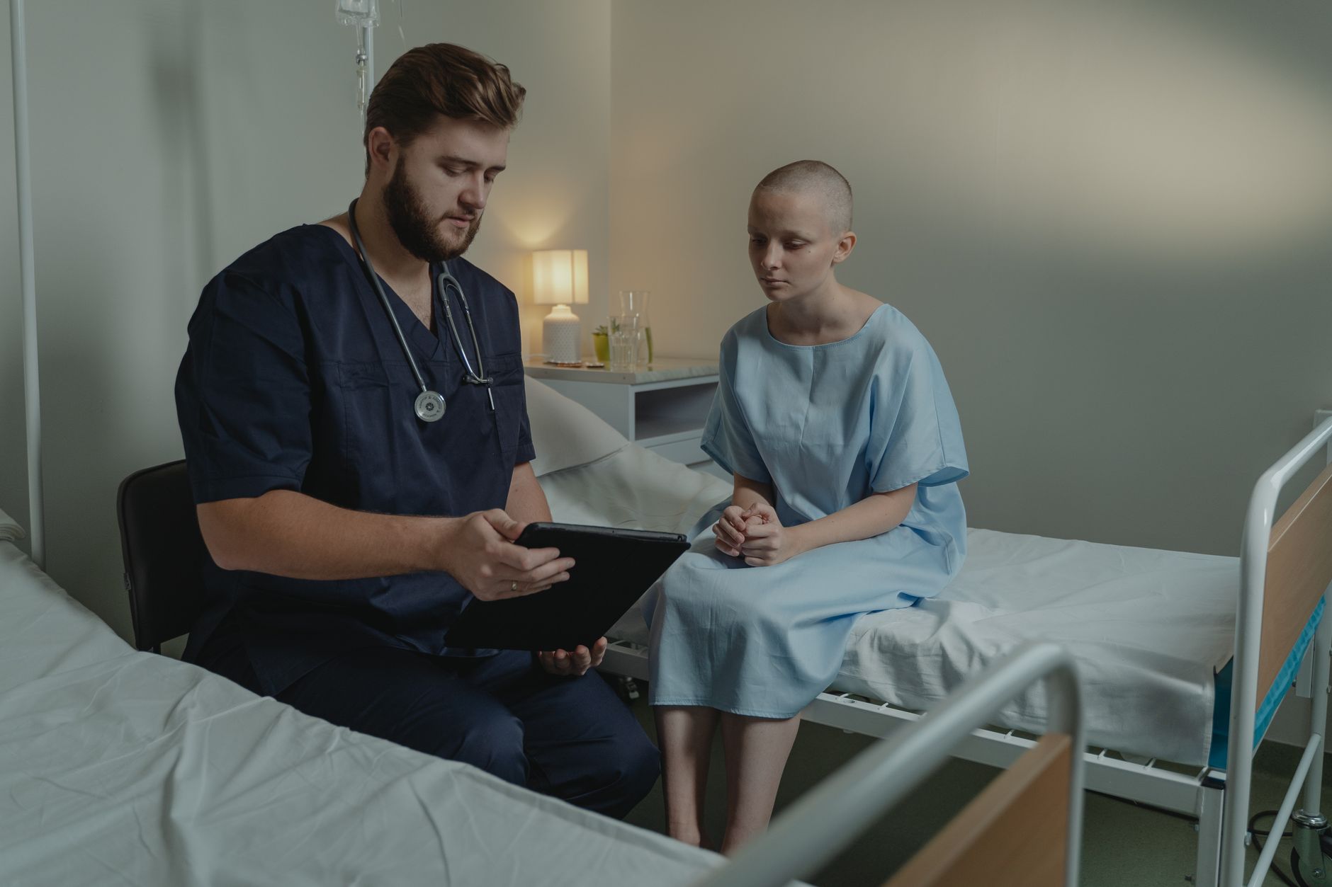 Psychiatric nurse using therapeutic communication with a patient