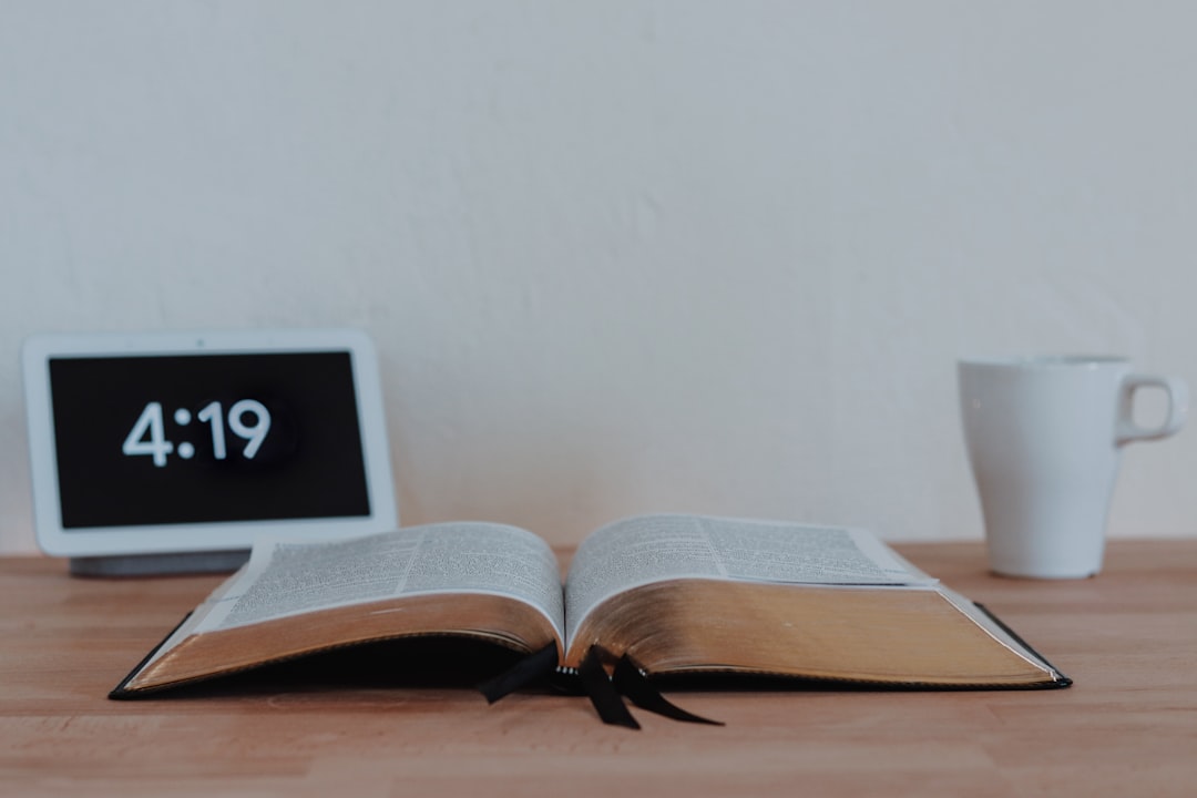 A clock beside study materials representing timed NCLEX retake practice