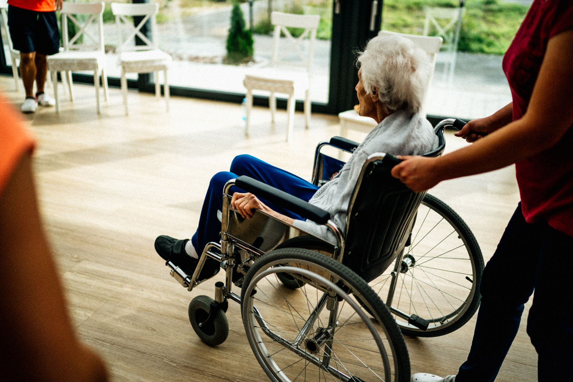 Licensed practical nurse caring for an elderly patient in long-term care
