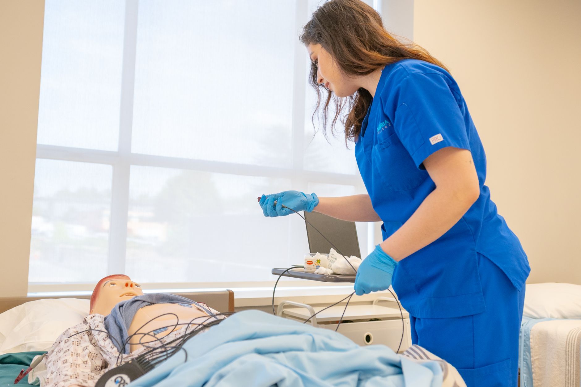 Nursing student reviewing Blue Book&ndash;style flashcards for the NCLEX