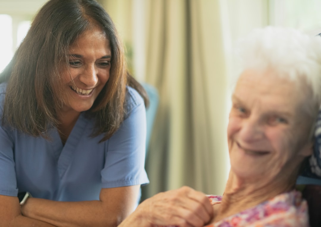 LPN providing care to an older adult patient, reflecting NCLEX-PN clinical scope