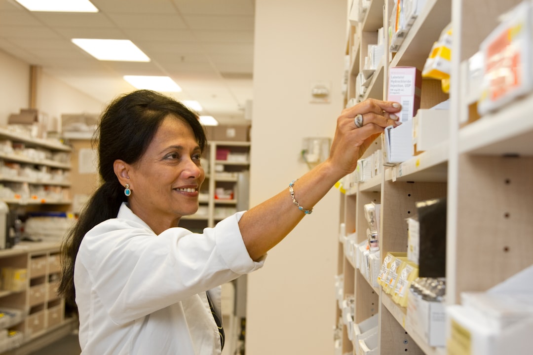 LPN preparing medications, reflecting the heavily weighted pharmacology content