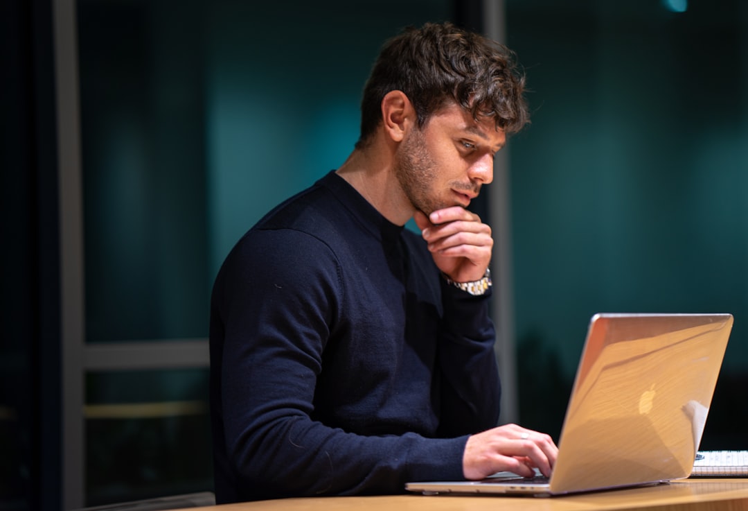 Comparing free NCLEX practice test options on a laptop