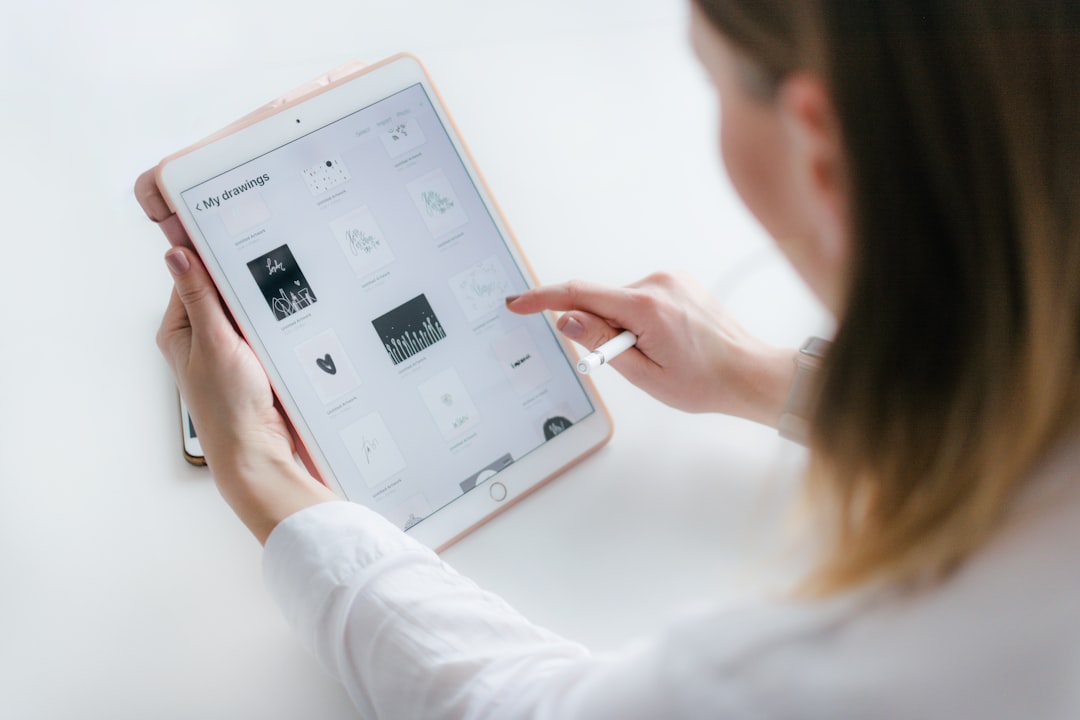 Candidate answering NGN-style NCLEX questions on a tablet
