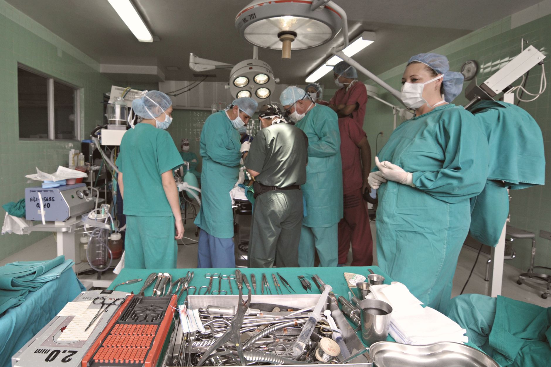 Physician assistant assisting in a surgical procedure