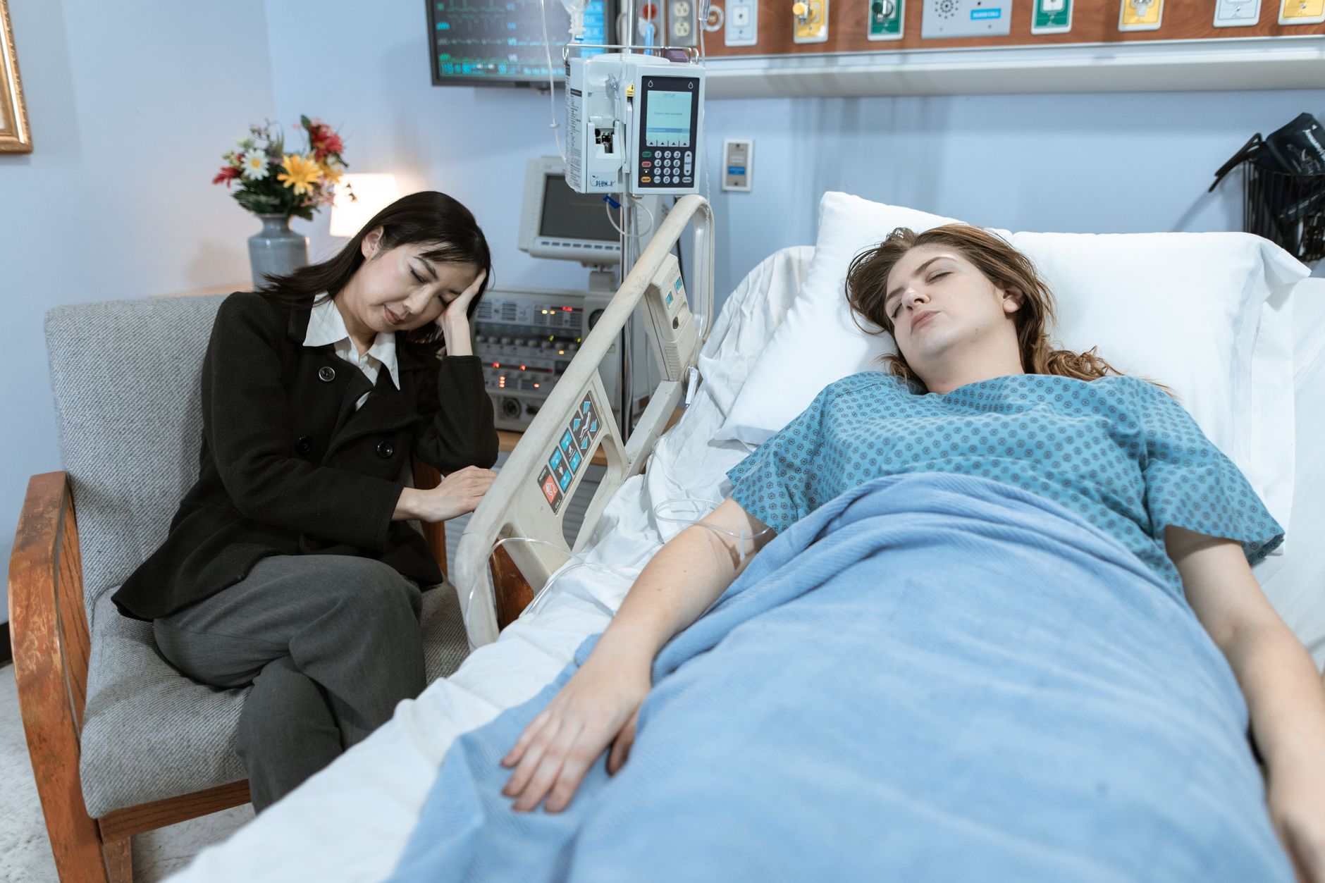 Nurse reassuring a distressed patient during a psychosocial safety assessment