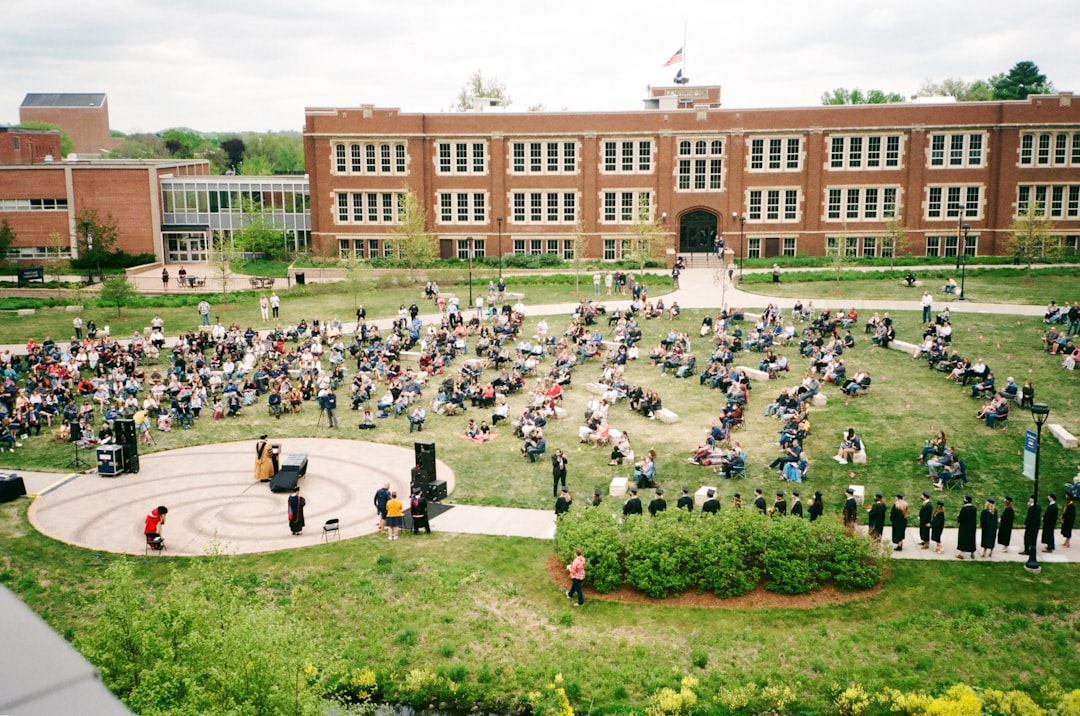 Nursing students on a university campus, where BSN programs set higher TEAS cutoffs