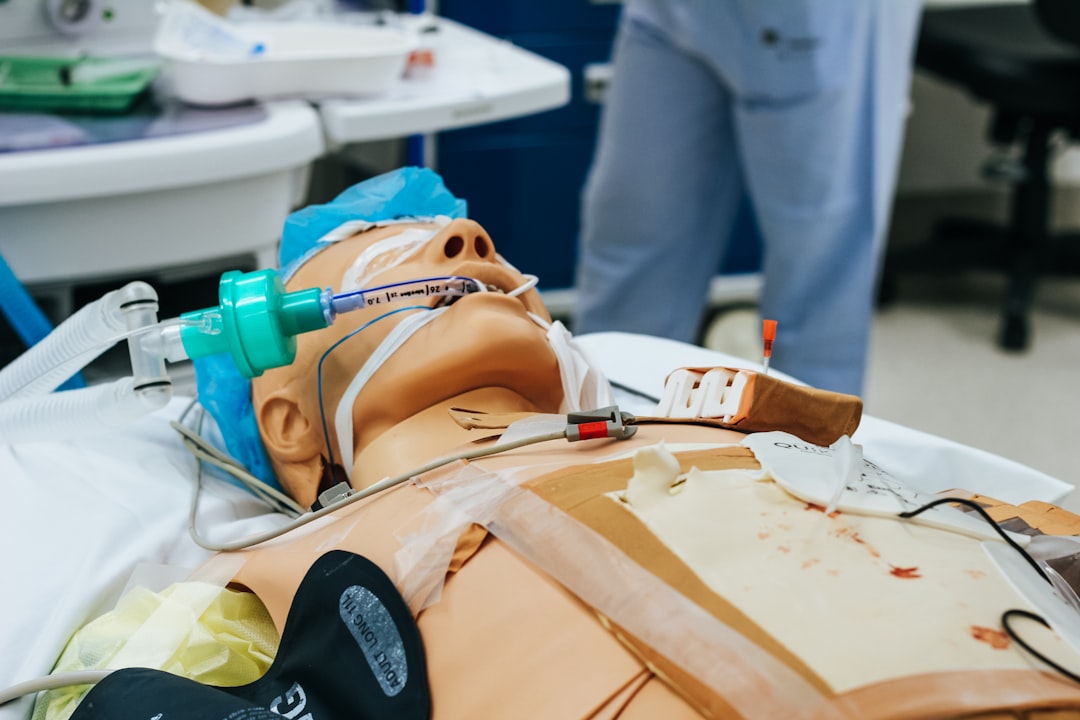 Nurse studying the TNCC Provider Manual before the open-book written exam
