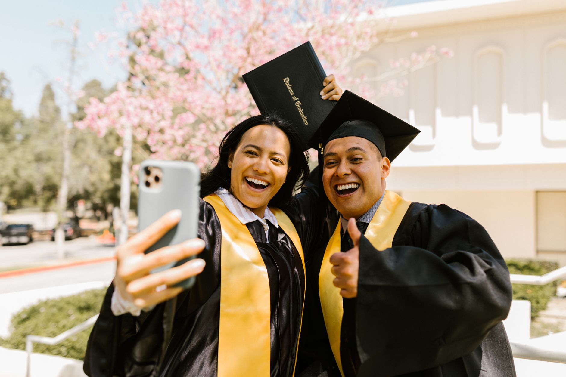 Nurse earning a doctoral nursing degree at graduation